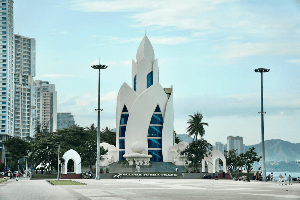 The image of the giant Tram Huong Tower, shaped like a lotus flower, stands proudly in the heart of Nha Trang City